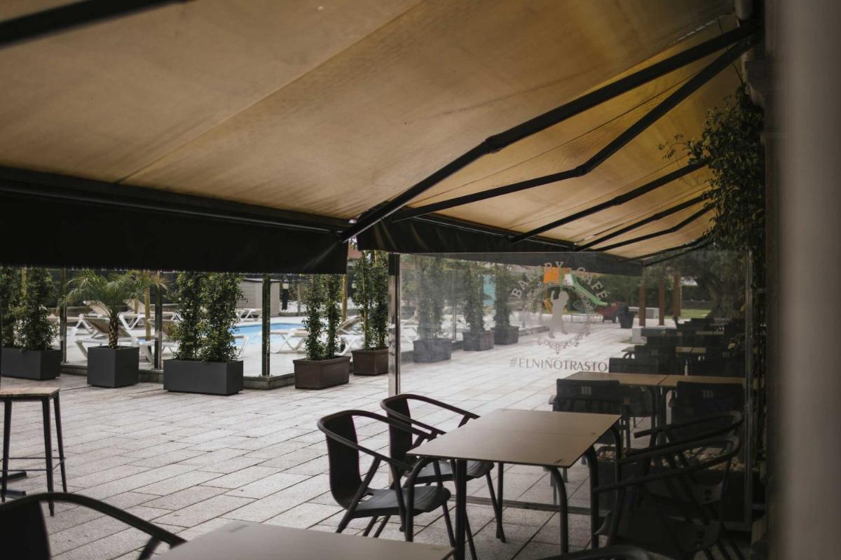 Un restaurante o sitio para comer en Hotel Alfonso I