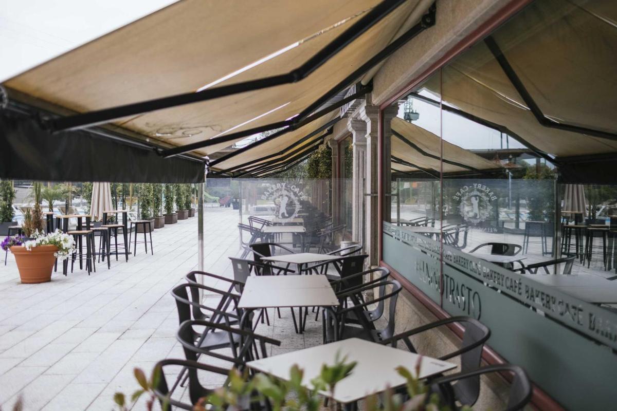 Un restaurante o sitio para comer en Hotel Alfonso I