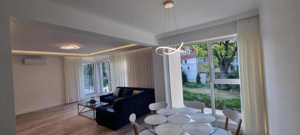 Apartament Zamkowa Park plus garaż podziemny oraz widok na Zamek krzyzacki z XIV wieku , ogród, rzekę i kanał węgorzewski - Housity