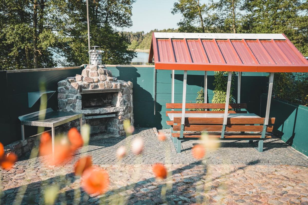 Tiny House direkt am See mit Grillecke - Housity