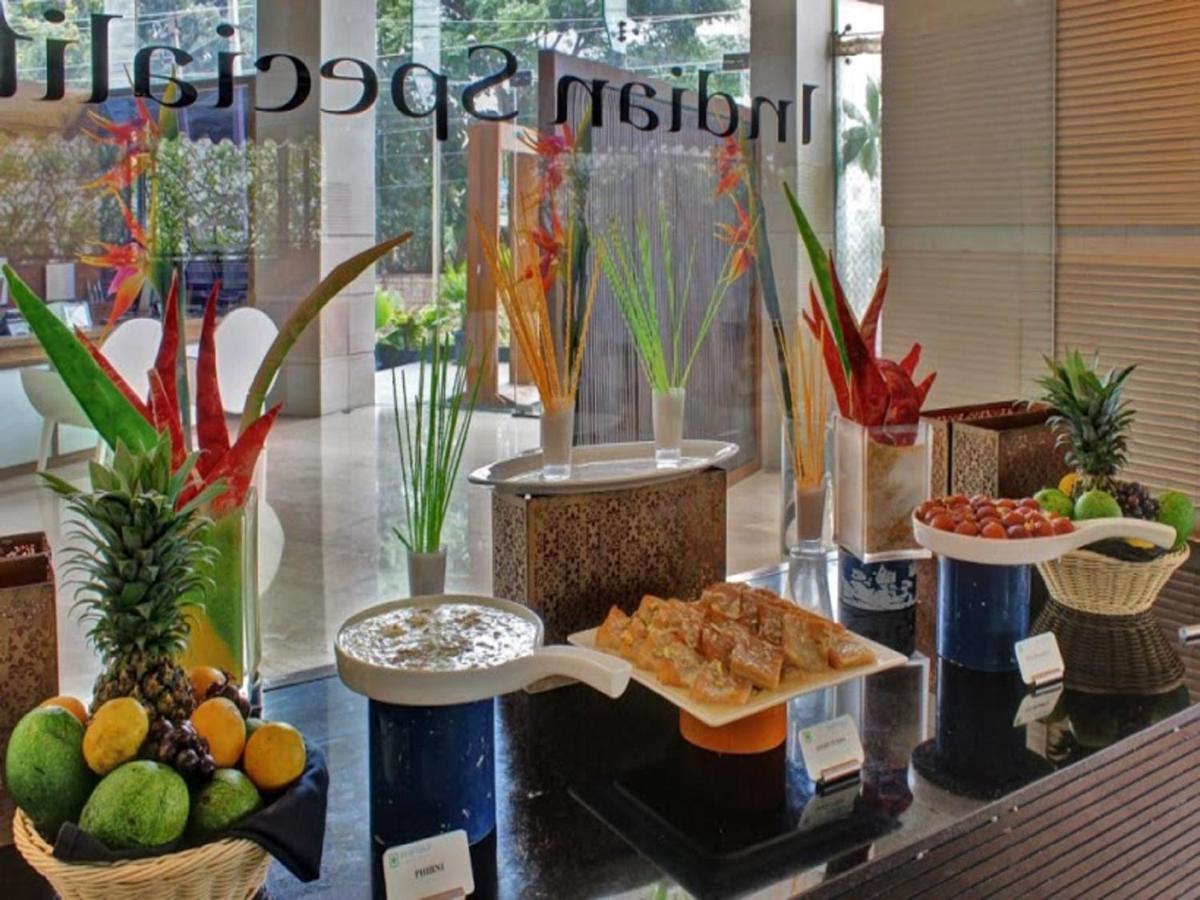 a buffet with different types of food on a counter at Svenska Design Hotel, Electronic City, Bangalore in Bengaluru a buffet with different types of food on a counter at Svenska Design Hotel, Electronic City, Bangalore in Bengaluru
