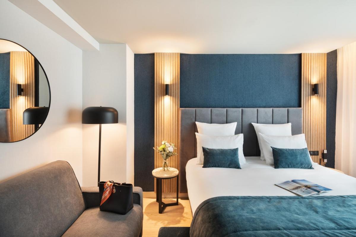 Un ou plusieurs lits dans un hébergement de l'établissement Hôtel & Spa Le Maury, Vannes, The Originals Boutique