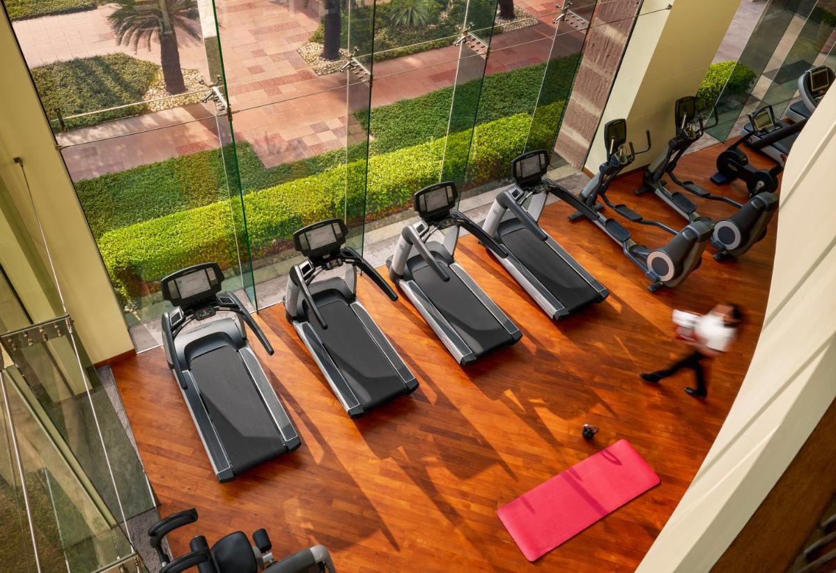 an overhead view of a row of exercise bikes in a gym at Hyatt Regency Kolkata in Kolkata an overhead view of a row of exercise bikes in a gym at Hyatt Regency Kolkata in Kolkata