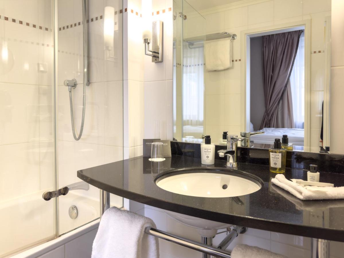 Ein Badezimmer in der Unterkunft Steigenberger Icon Parkhotel Düsseldorf