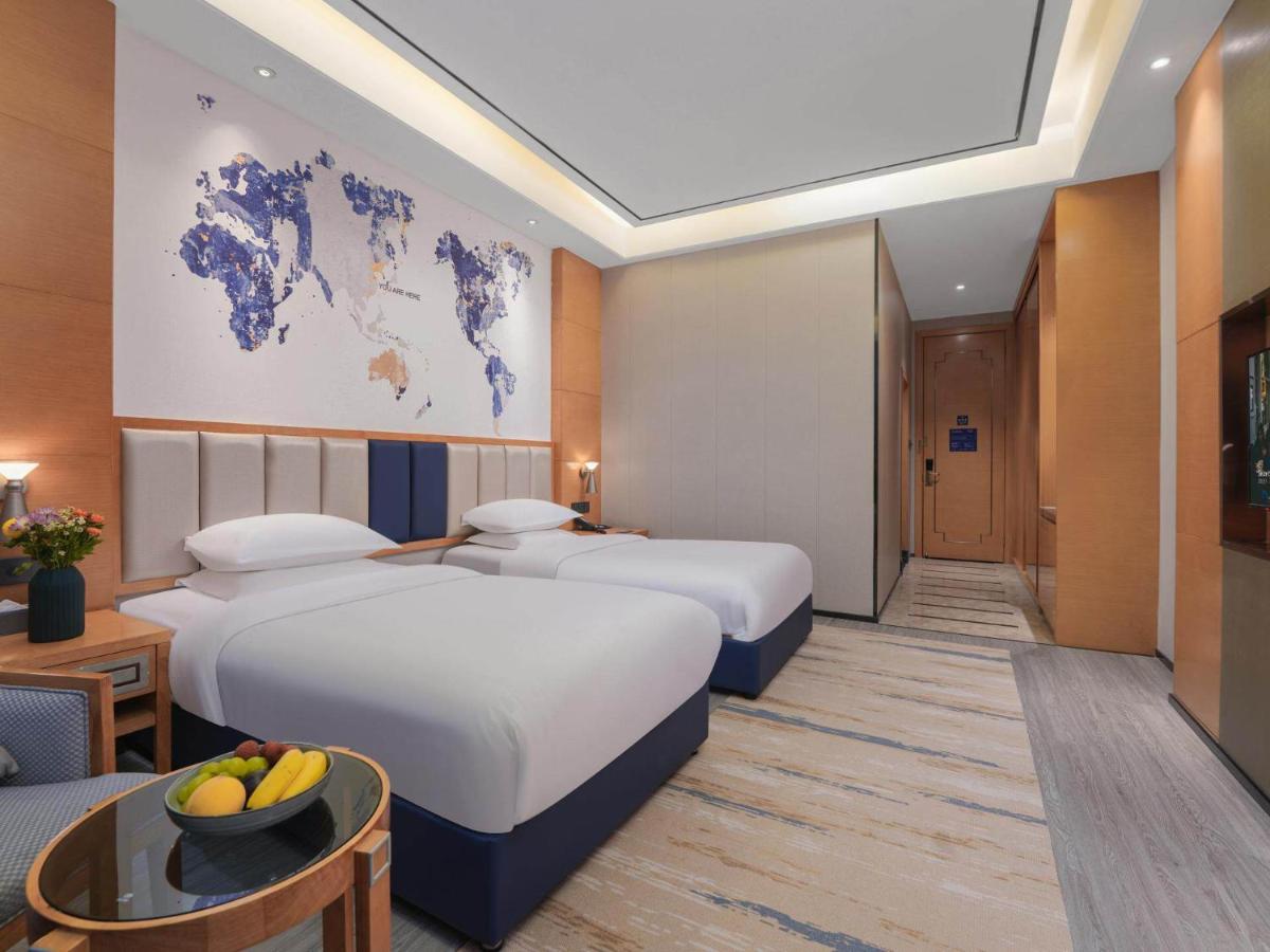 Kyriad Hotel Baoying Jinyuan Square High-speed Railway Station - Housity