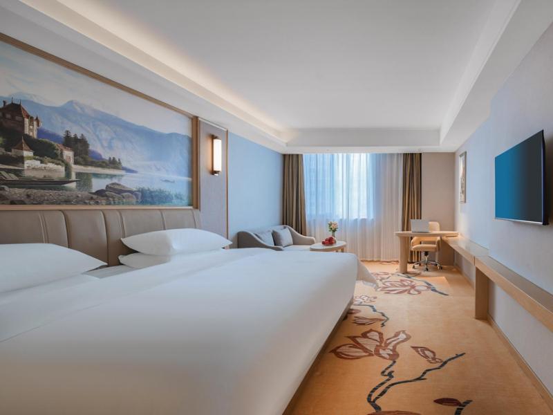 Vienna Hotel Yangzhou Gaoyou Dongfangyujing - Housity