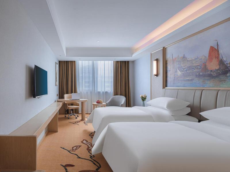Vienna Hotel Yangzhou Gaoyou Dongfangyujing - Housity