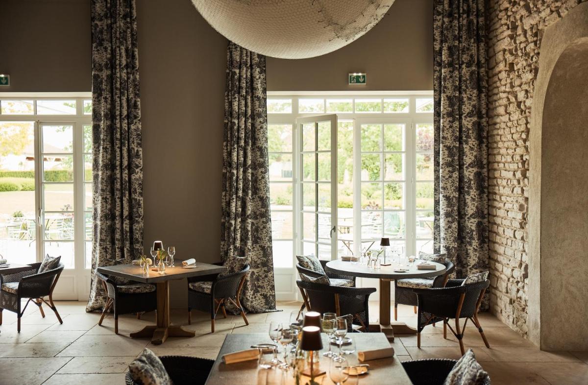 Coin salon dans l'établissement COMO Le Montrachet