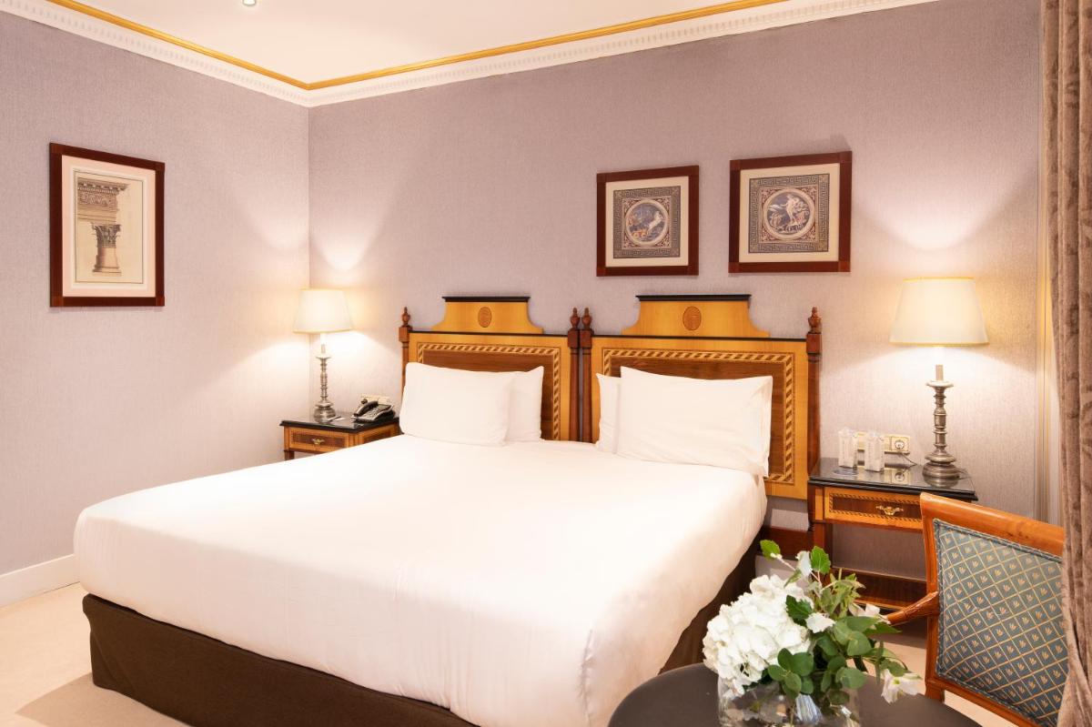 Cama o camas de una habitación en Eurostars Hotel de la Reconquista