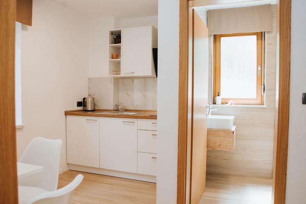 Apartmaji URŠIČ - Housity
