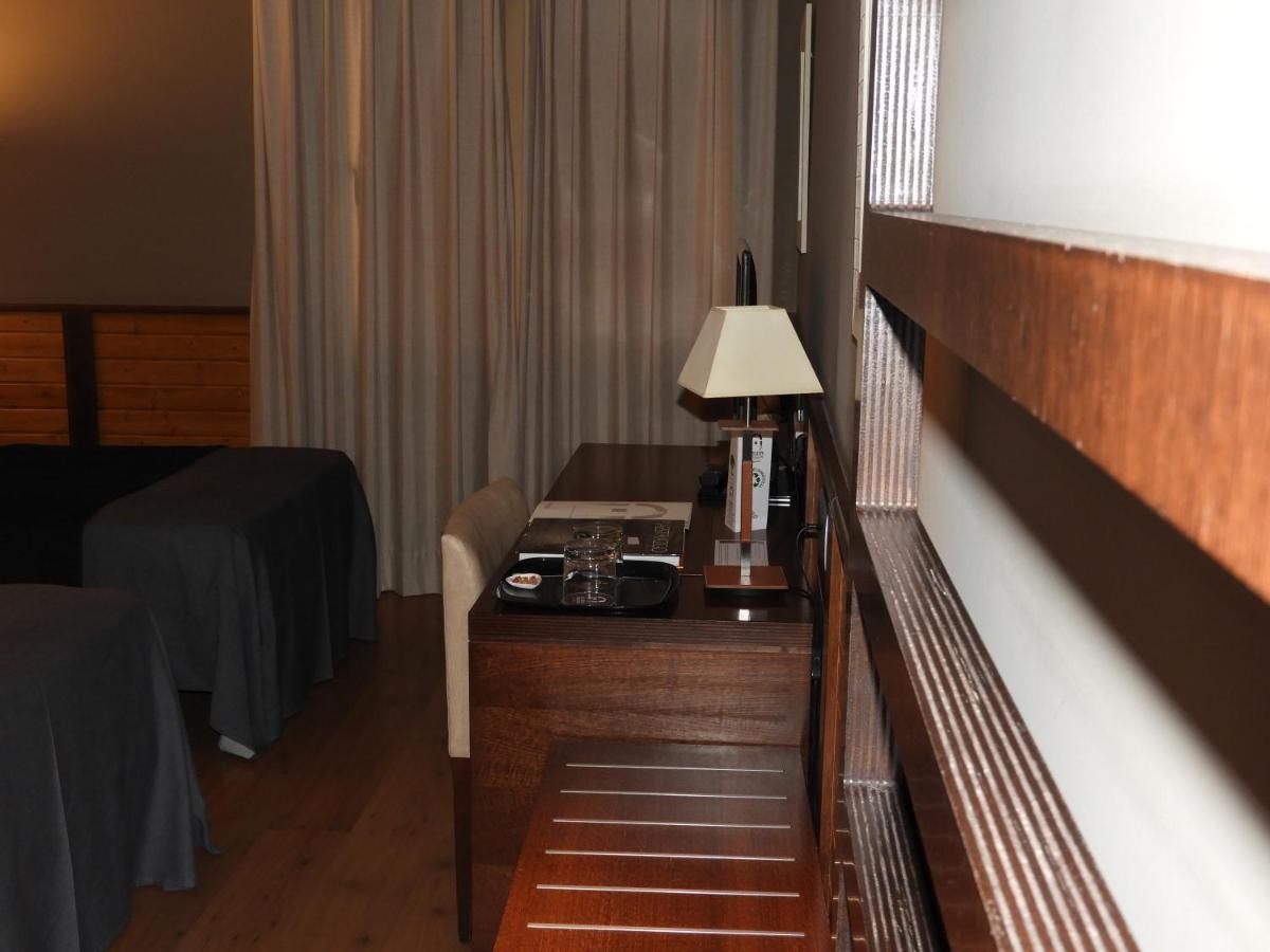 Cama o camas de una habitación en Hotel Spa Balfagon