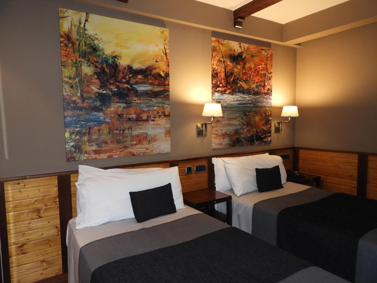 Cama o camas de una habitación en Hotel Spa Balfagon