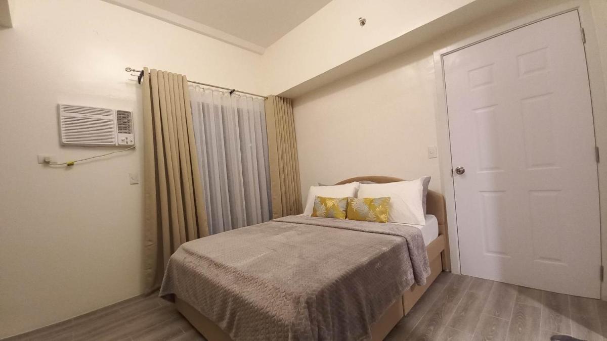 Suitetrails - Spacious 1 Bedroom Condo Unit at Amani Grand Citygate