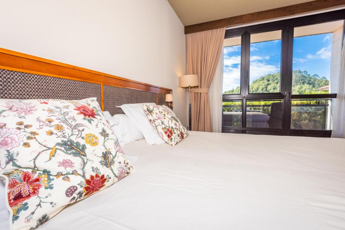 Cama o camas de una habitación en Hosteria de Torazo Nature Hotel & Spa