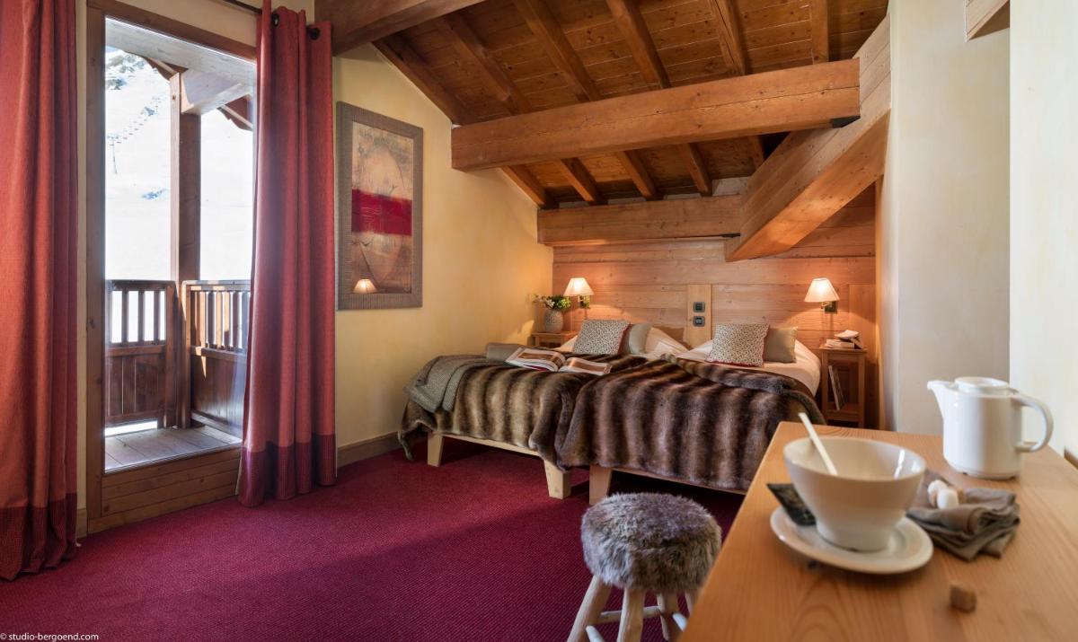 Un ou plusieurs lits dans un hébergement de l'établissement Résidences Village Montana by Les Etincelles