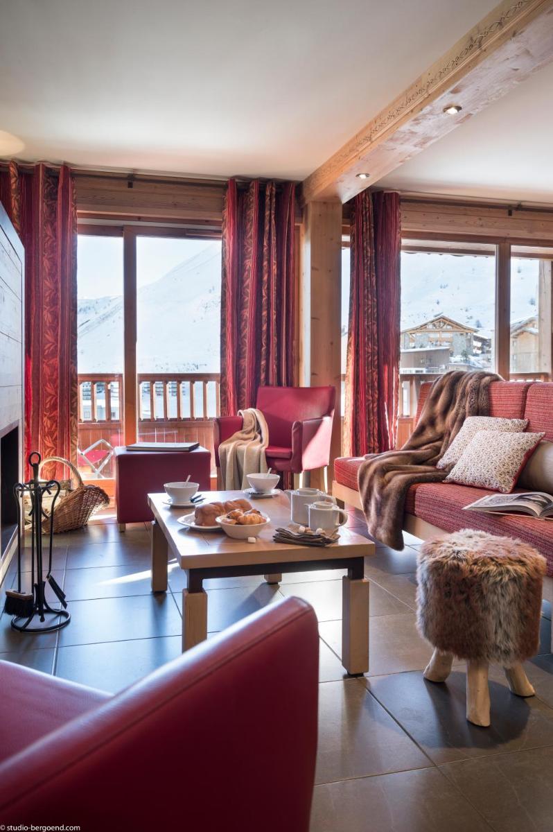 Coin salon dans l'établissement Résidences Village Montana by Les Etincelles