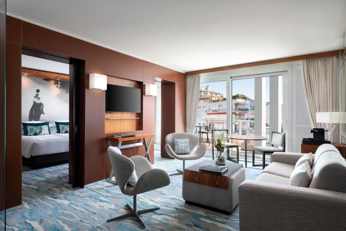 Un ou plusieurs lits dans un hébergement de l'établissement JW Marriott Cannes