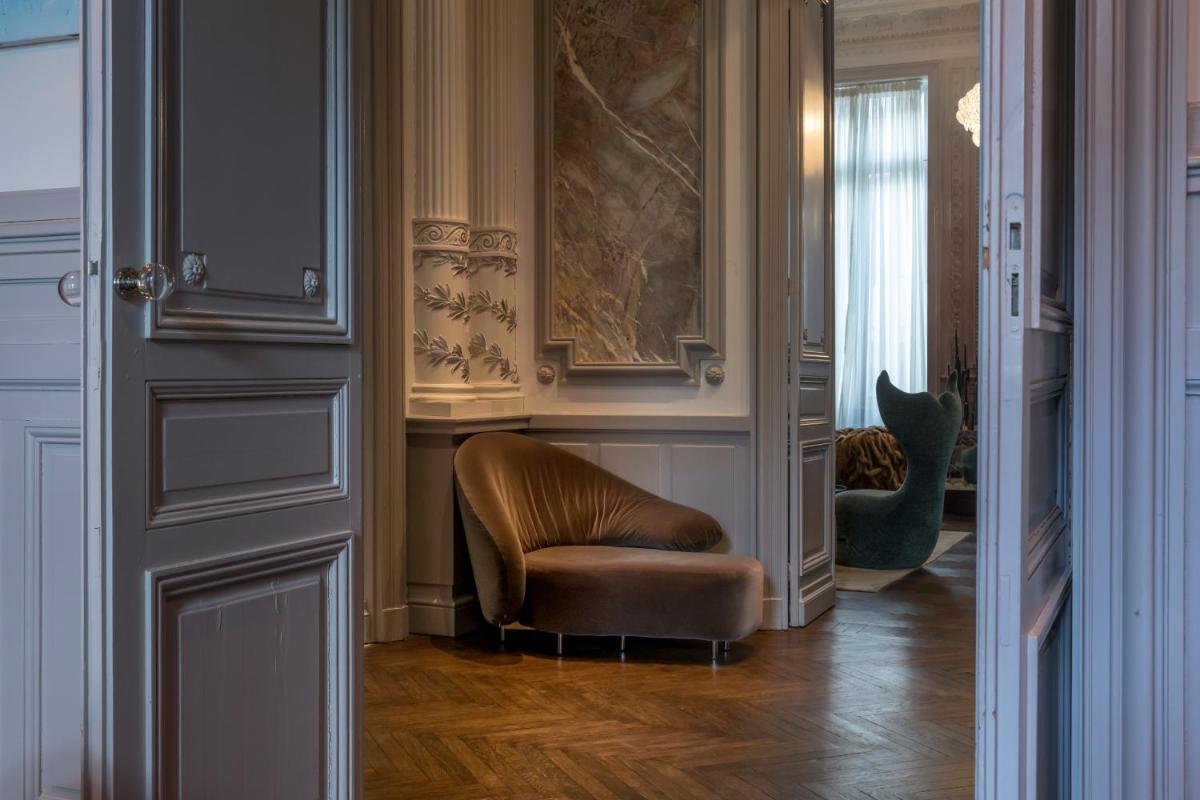 Coin salon dans l'établissement Yndo Hôtel
