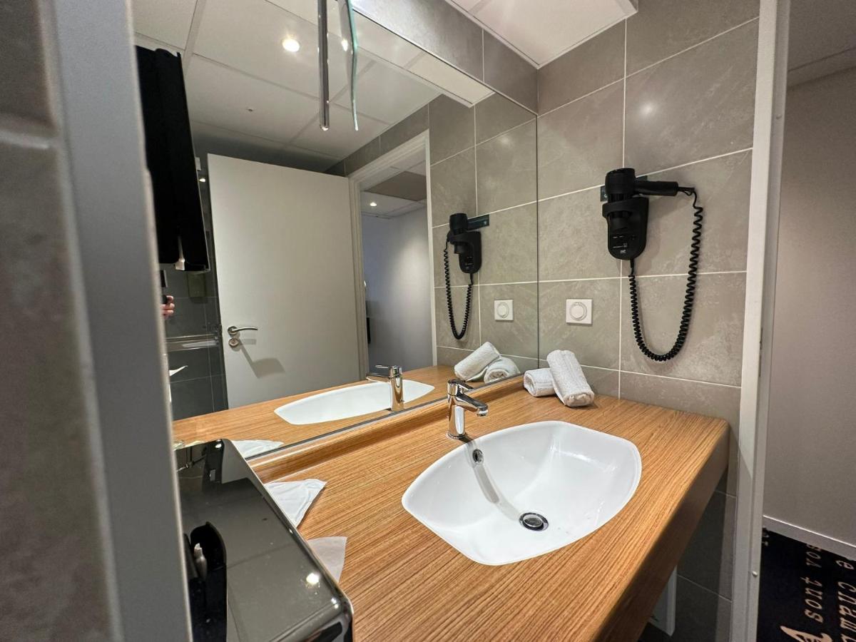 Salle de bains dans l'établissement Best Western Plus Thionville Centre