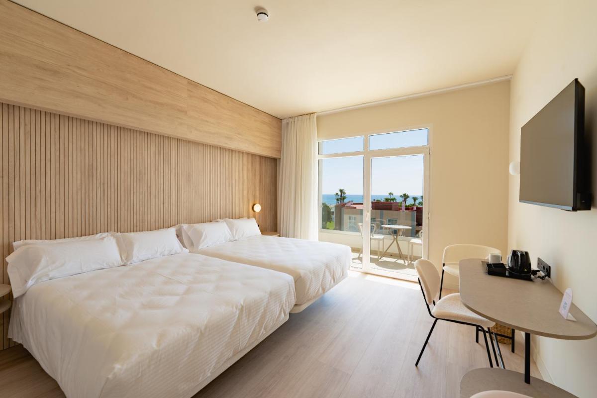 Cama o camas de una habitación en RH Silene Hotel & Spa 4 Sup
