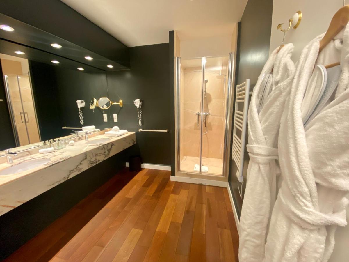 Salle de bains dans l'établissement HR Hôtel-Restaurant & Spa Marin