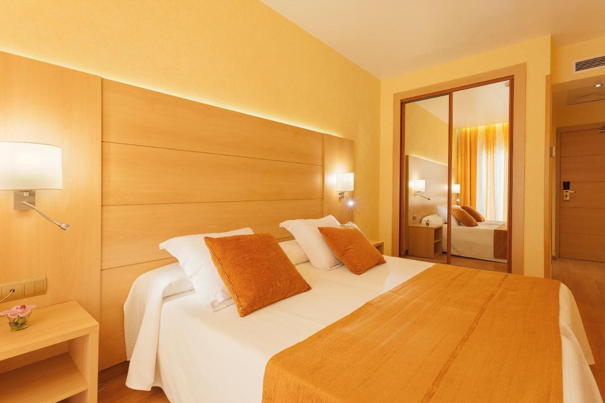 Cama o camas de una habitación en Hotel Pimar & Spa