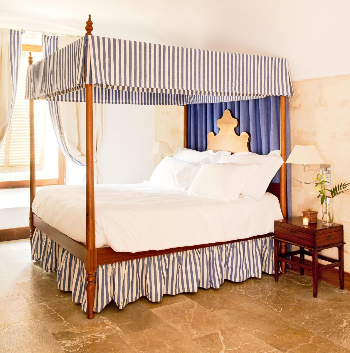 Cama o camas de una habitación en Cap Rocat, a Small Luxury Hotel of the World