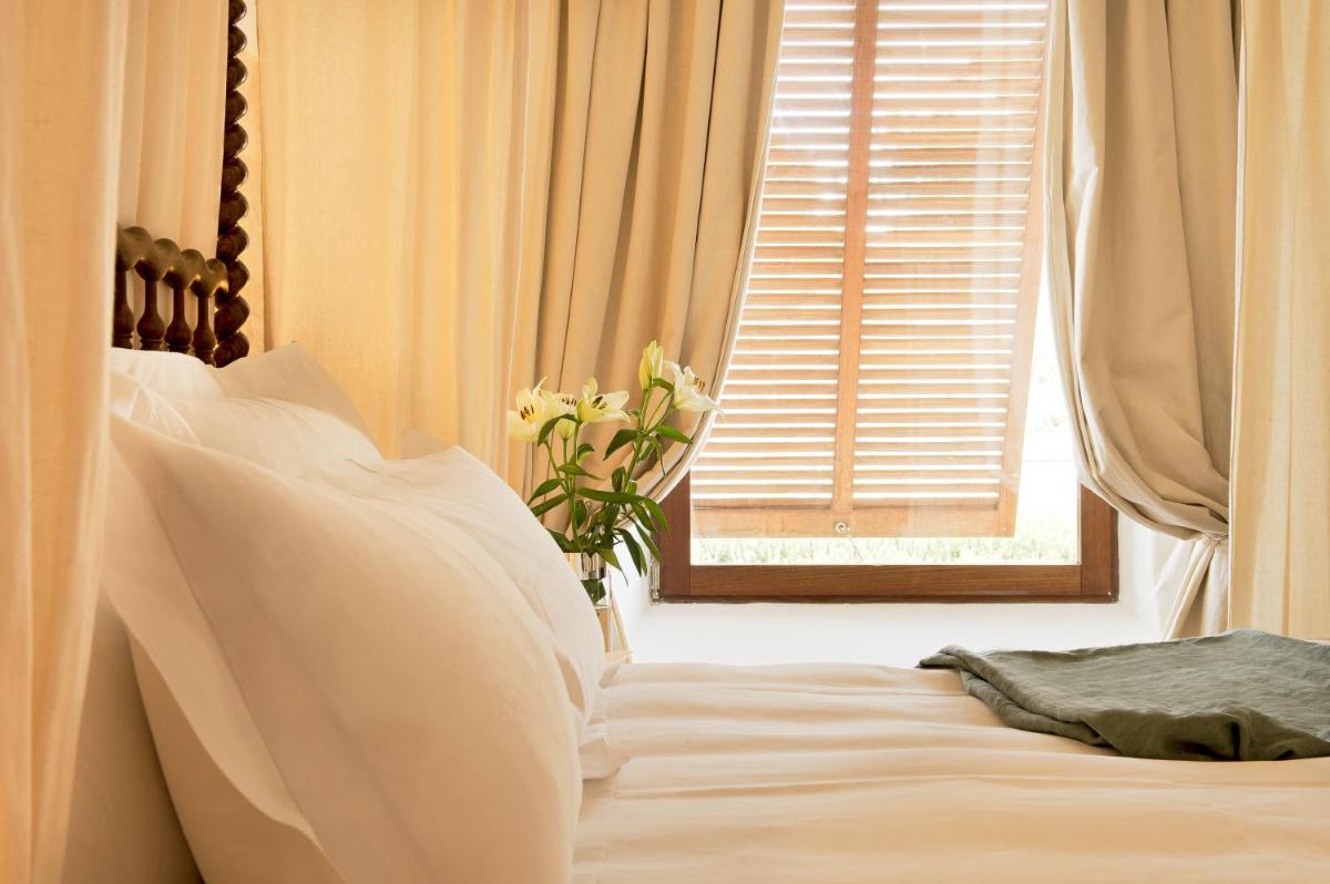 Cama o camas de una habitación en Cap Rocat, a Small Luxury Hotel of the World