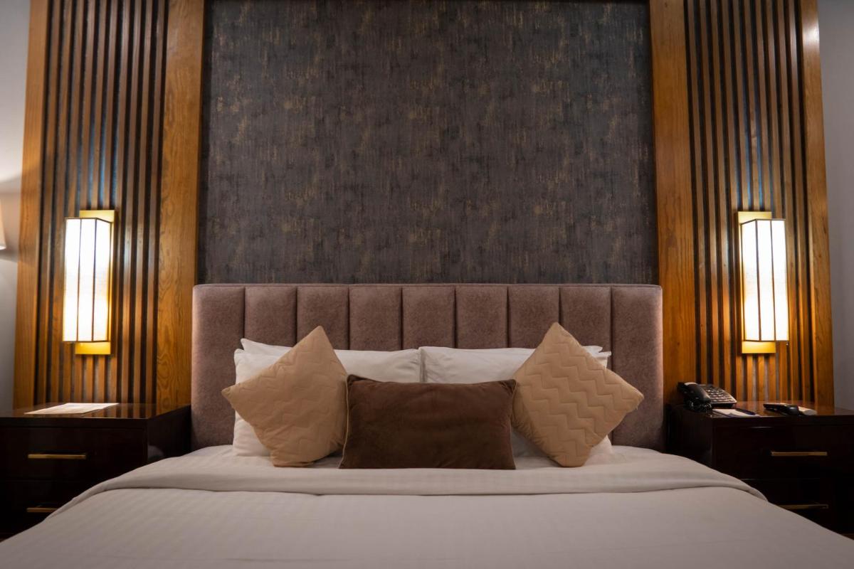 Magnum Swiss Inn - Housity