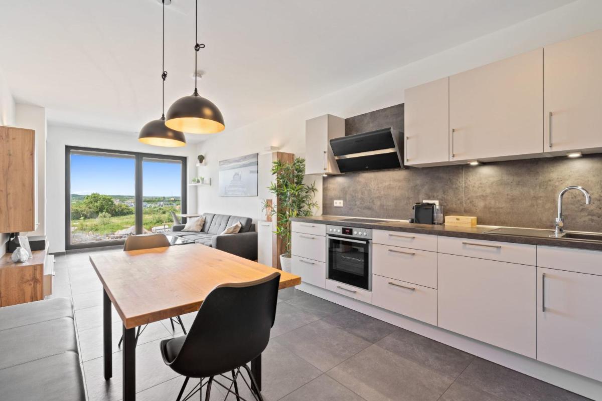 Cloche d'Or Proximity - Sleek Urban Space - Housity