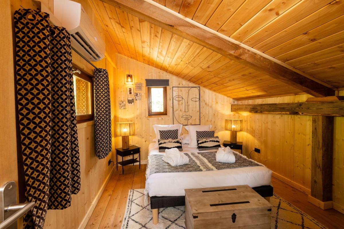 Coin salon dans l'établissement Domaine de Chalvêches Hôtel SPA 4*