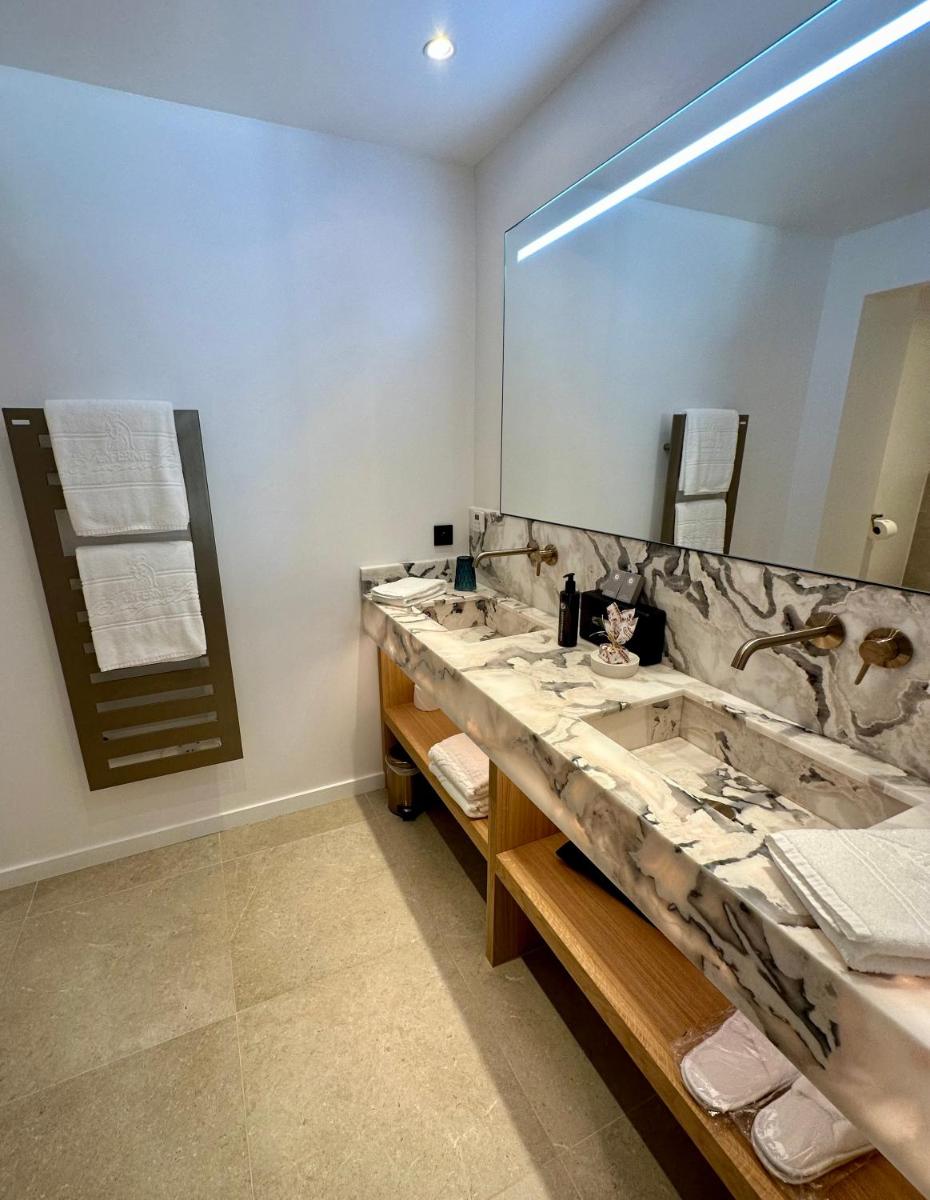 Salle de bains dans l'établissement La Ferme D'Augustin