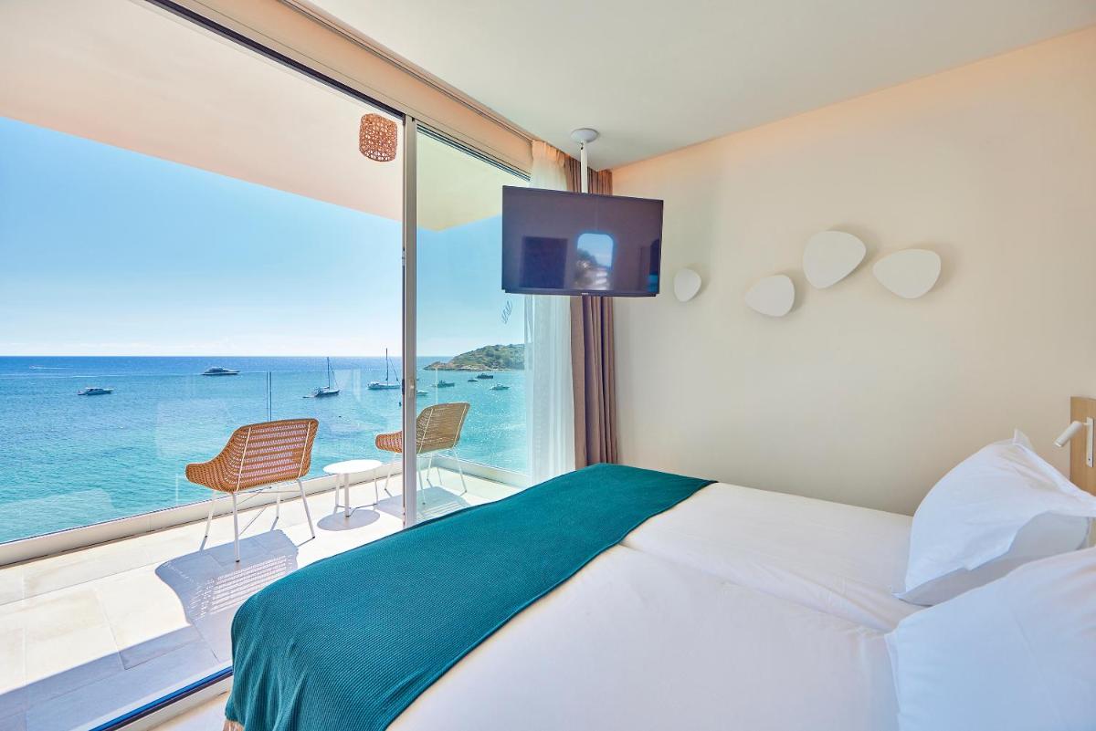 Cama o camas de una habitación en Universal Hotel Aquamarin