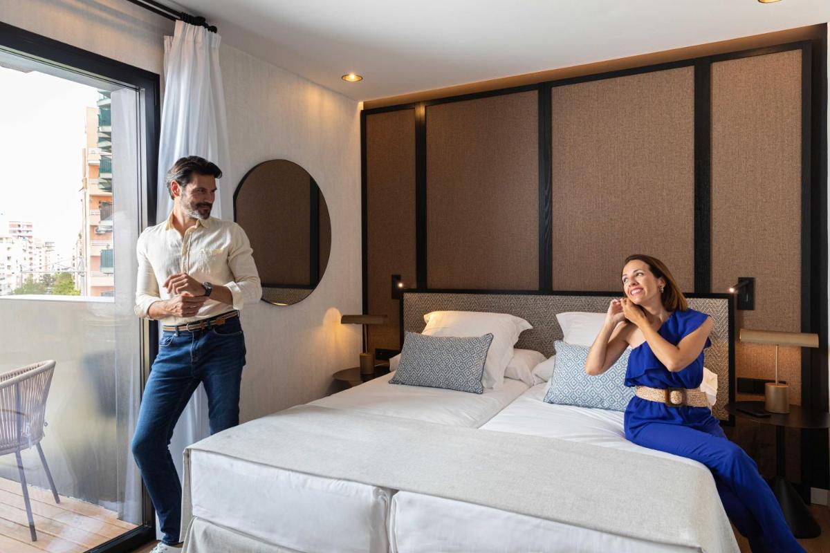 Cama o camas de una habitación en JS Palma Plaza