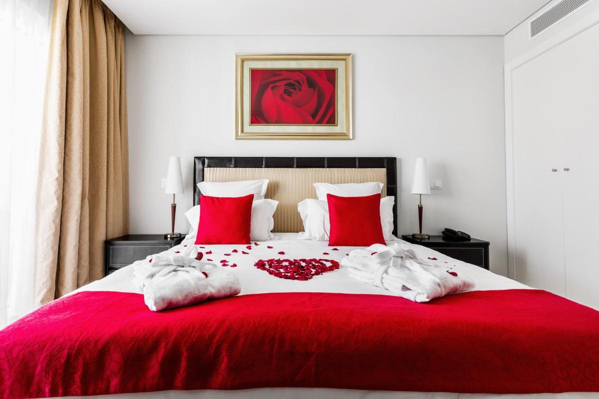 Uma cama ou camas num quarto em As Cascatas Golf Resort & Spa