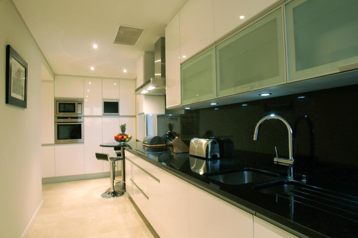 A cozinha ou kitchenette de As Cascatas Golf Resort & Spa