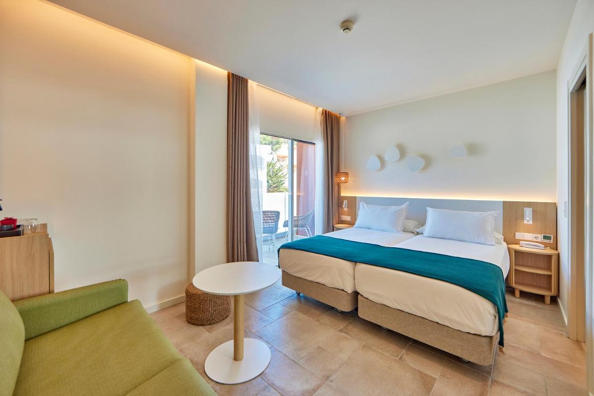 Cama o camas de una habitación en Universal Hotel Aquamarin