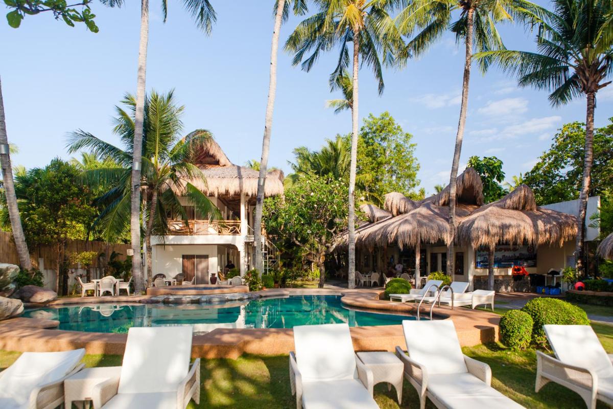 Mike's Dauin Dive Resort - Housity