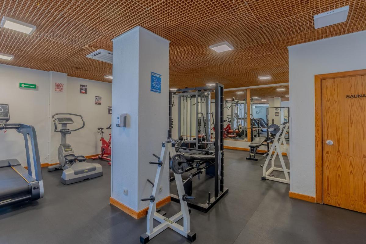 O centro de fitness e/ou as comodidades de fitness de Muthu Oura Praia Hotel