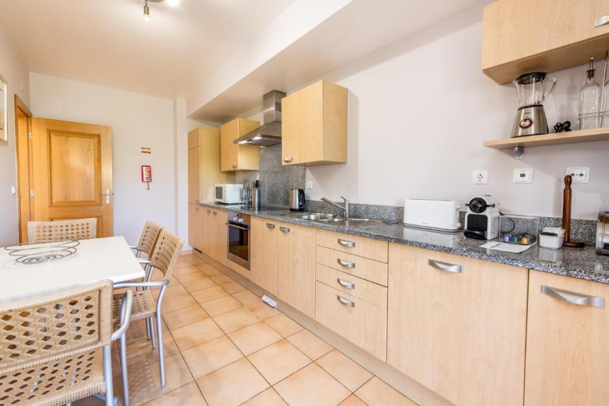 A cozinha ou kitchenette de Estrela da Luz Resort