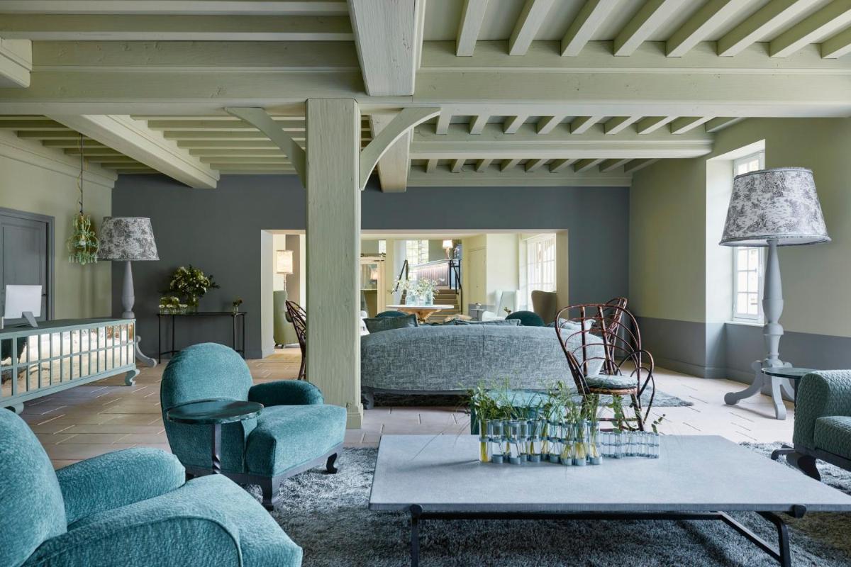 Coin salon dans l'établissement COMO Le Montrachet