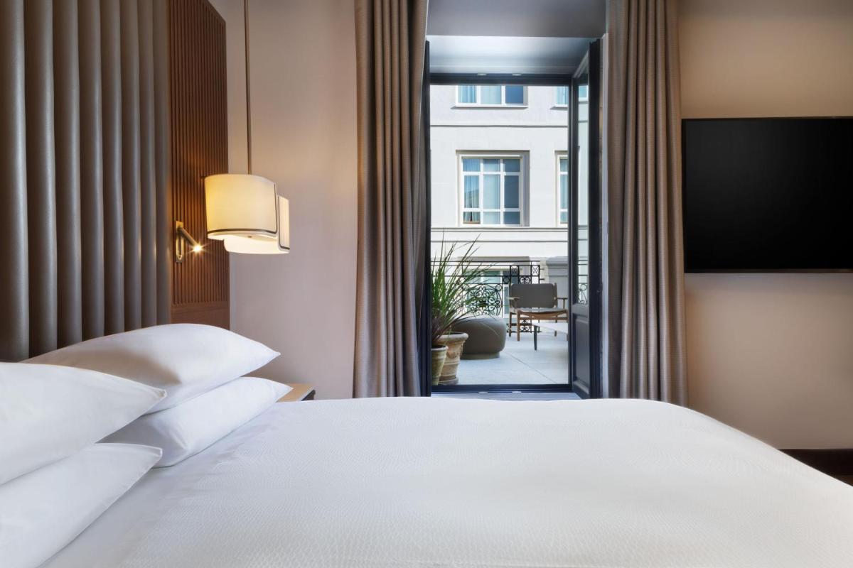 Cama o camas de una habitación en JW Marriott Hotel Madrid