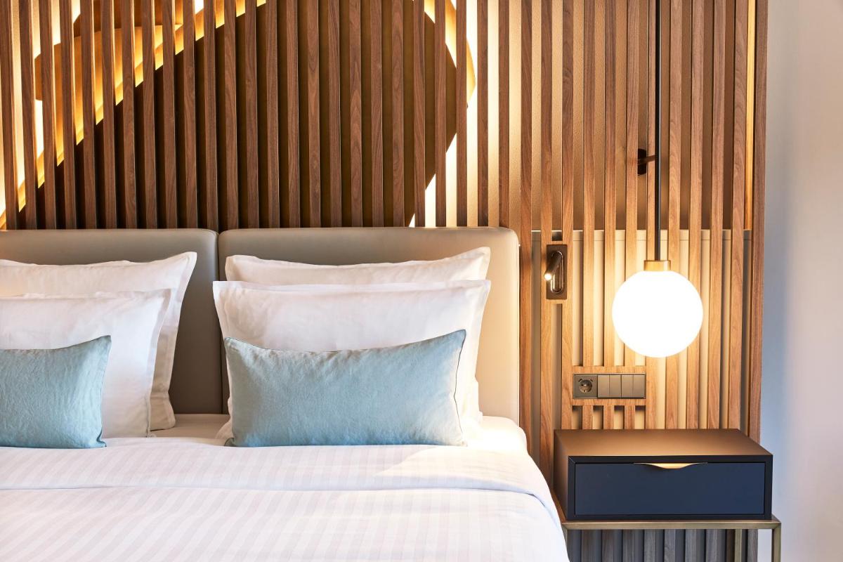 Ein Bett oder Betten in einem Zimmer der Unterkunft Steigenberger Hotel Hamburg Ein Bett oder Betten in einem Zimmer der Unterkunft Steigenberger Hotel Hamburg