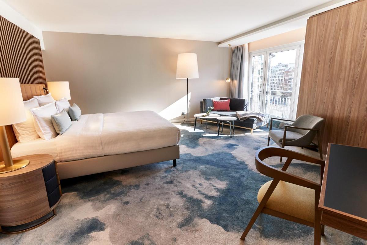 Ein Bett oder Betten in einem Zimmer der Unterkunft Steigenberger Hotel Hamburg Ein Bett oder Betten in einem Zimmer der Unterkunft Steigenberger Hotel Hamburg