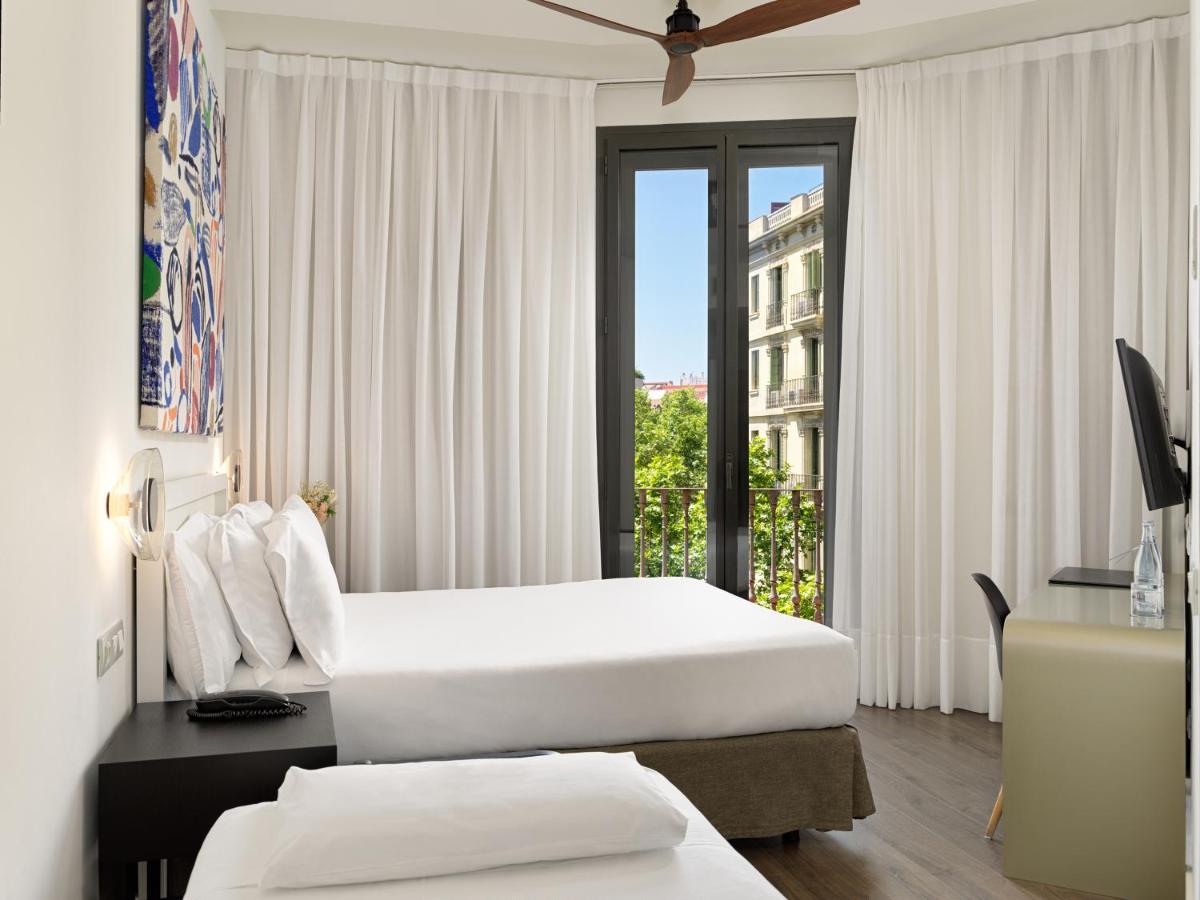 Cama o camas de una habitación en H10 Casanova