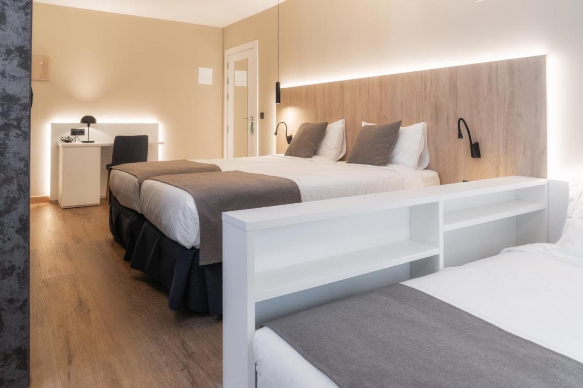Cama o camas de una habitación en Hotel Montarto