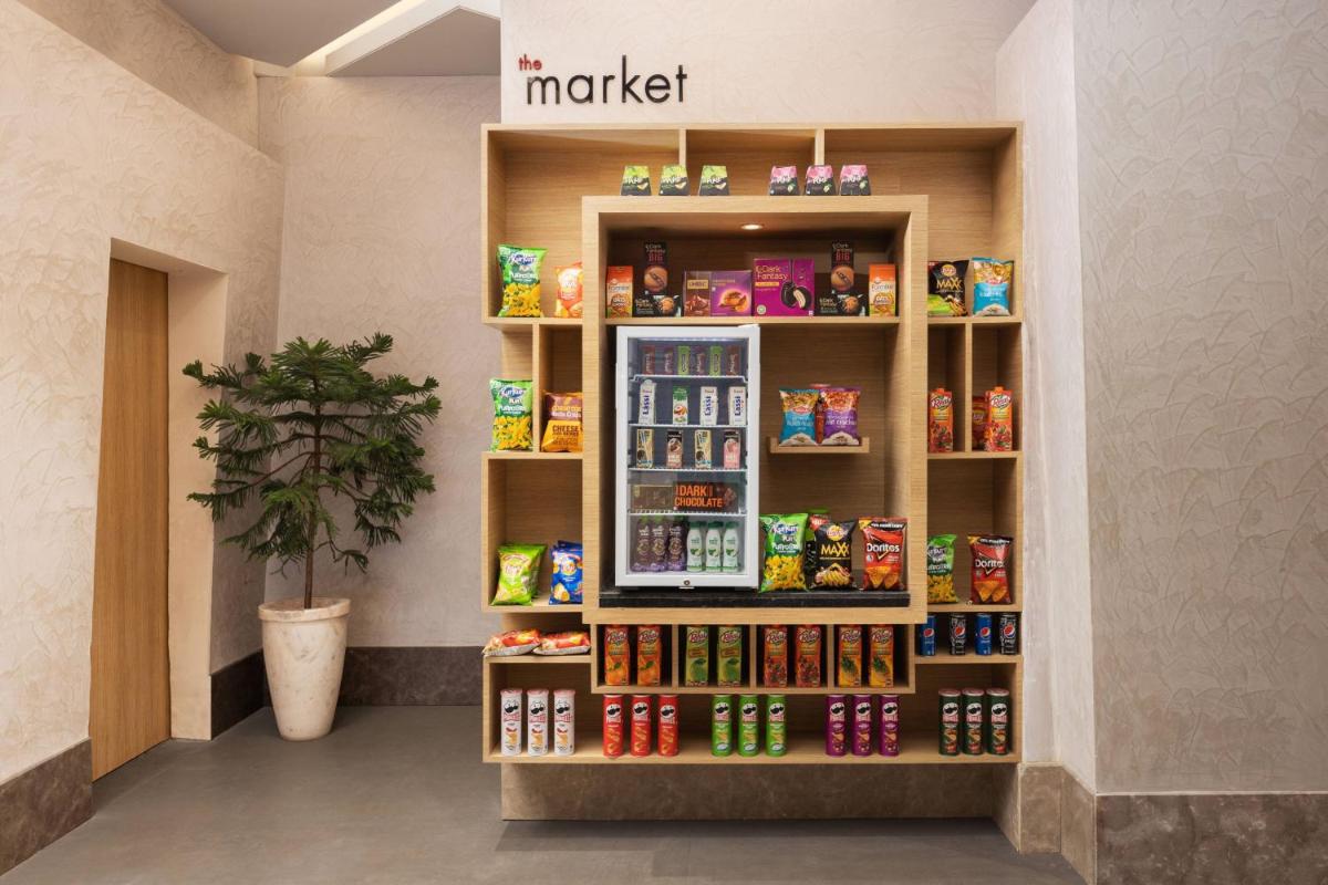 a store with a display of food and drinks at Fairfield by Marriott Jaipur in Jaipur