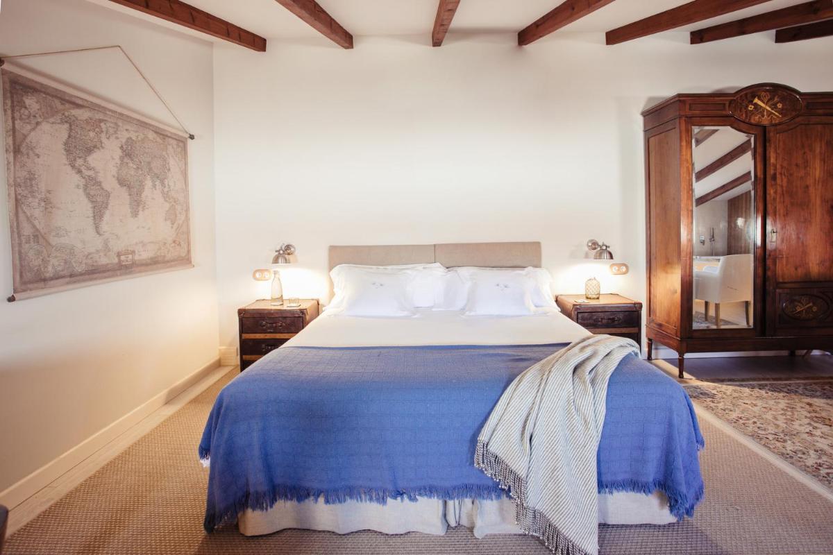 Cama o camas de una habitación en Jardí de Ses Bruixes Boutique Hotel