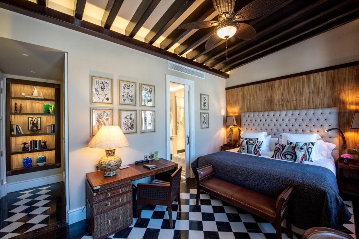 Cama o camas de una habitación en Hotel Casa Palacio María Luisa