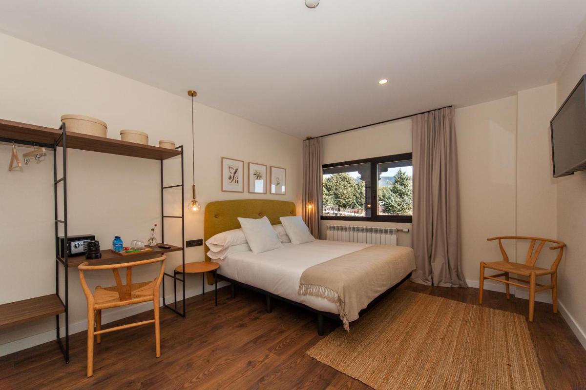 Cama o camas de una habitación en Duruelo Mountain Suites